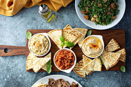 Mezze board with pita and dips, a Food & Drink Photo by farwasser