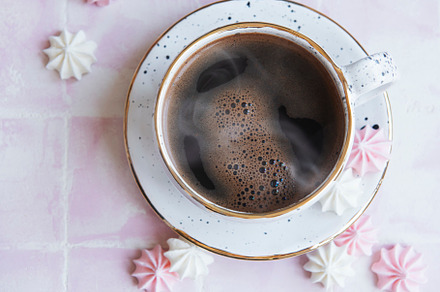 Cup with coffee and small meringues, a Food & Drink Photo by Olena Rudo