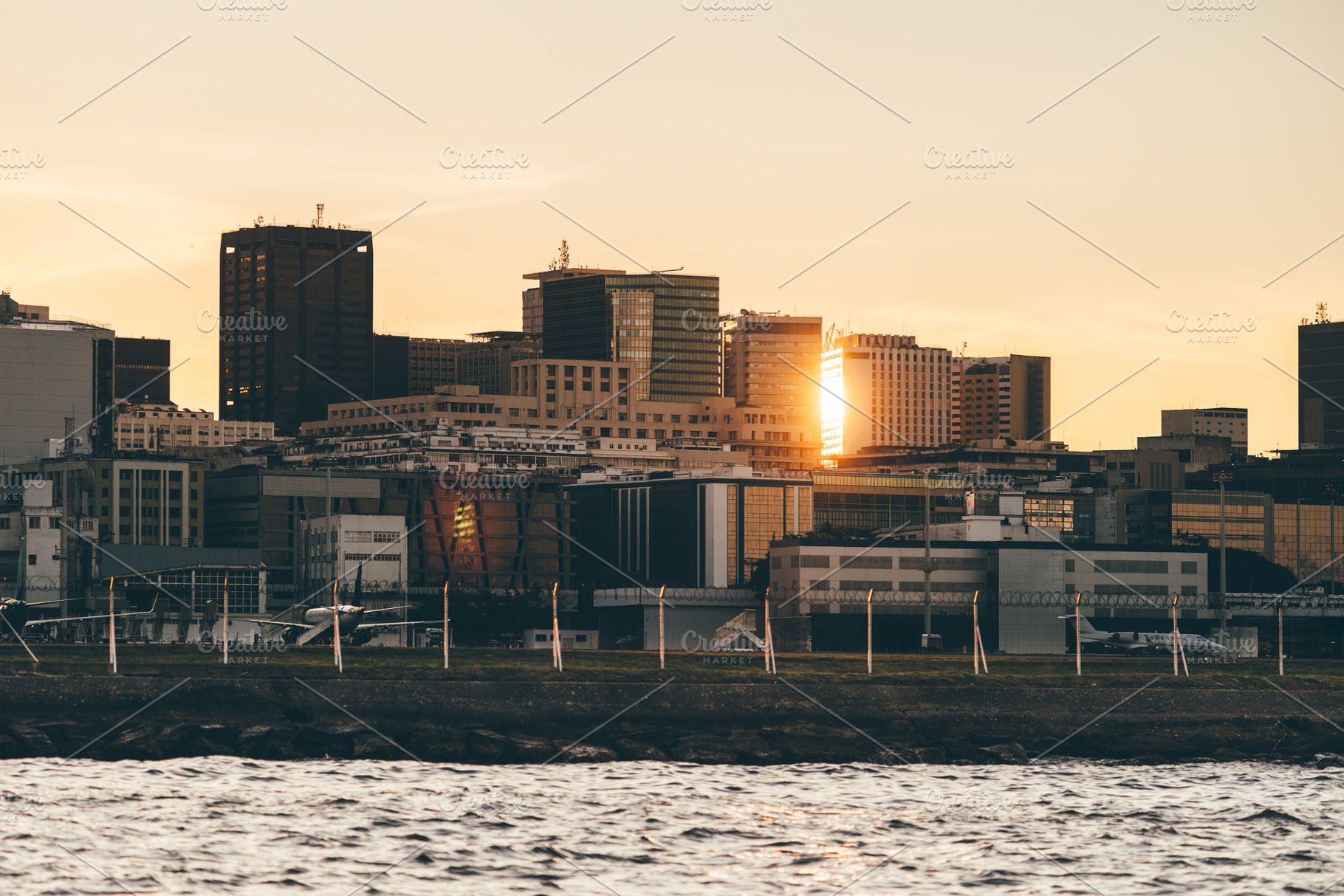 Sunset skyline by airport, an Architecture Photo by SkyNext