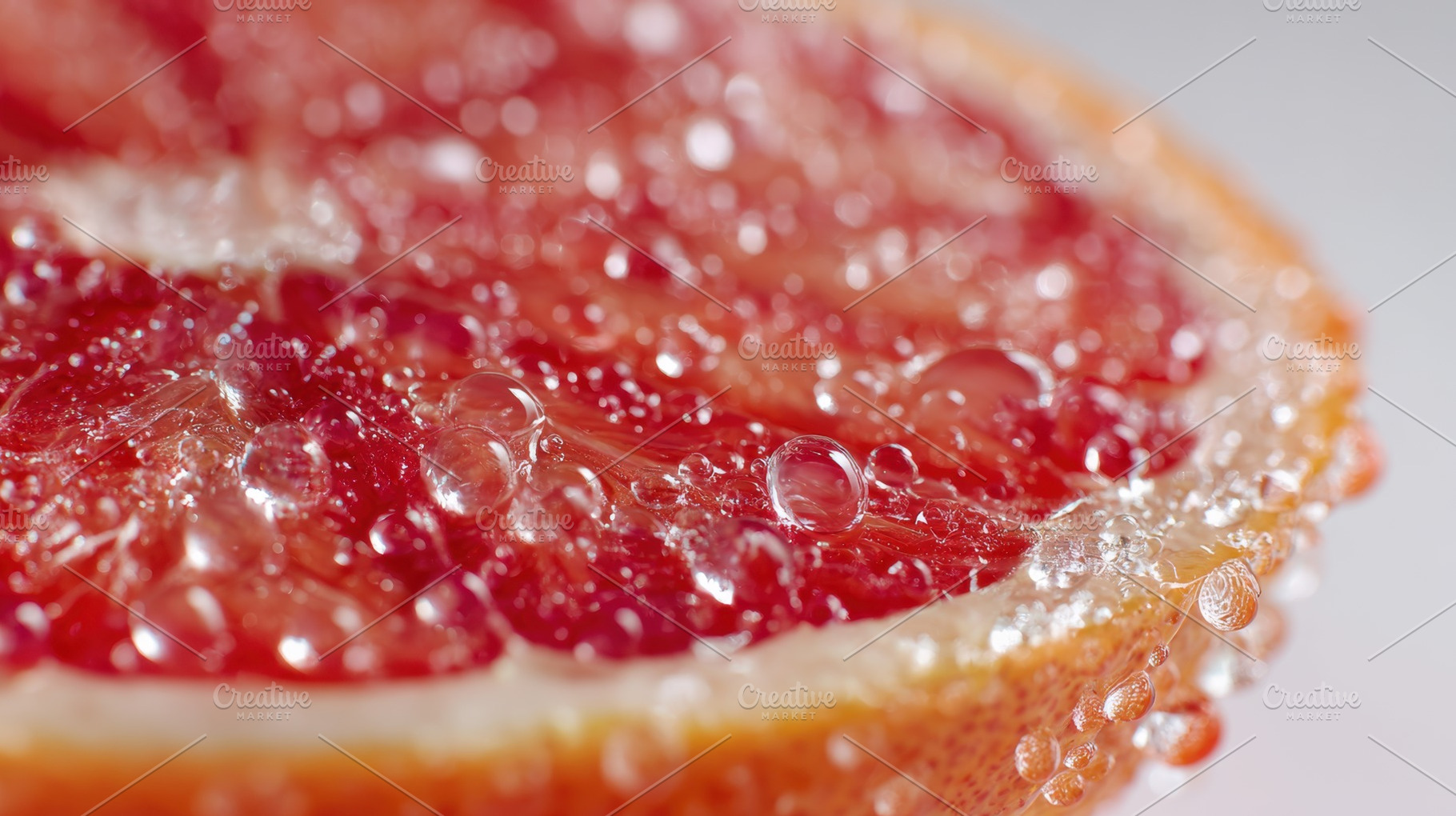 Fresh grapefruit slice with bubbles, a Photo by Beautiful things