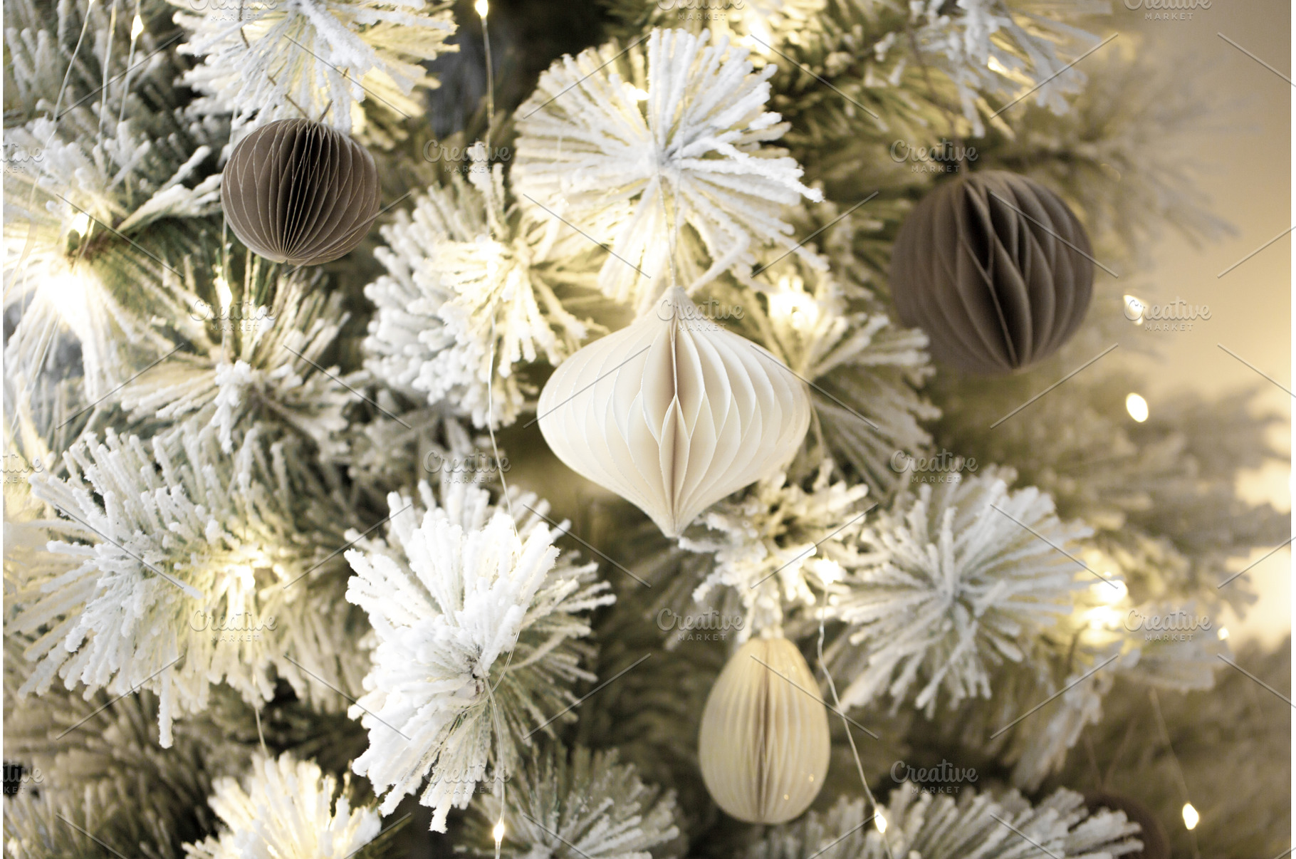 Flocked christmas tree with paper, a Holiday Photo by Anna Efetova