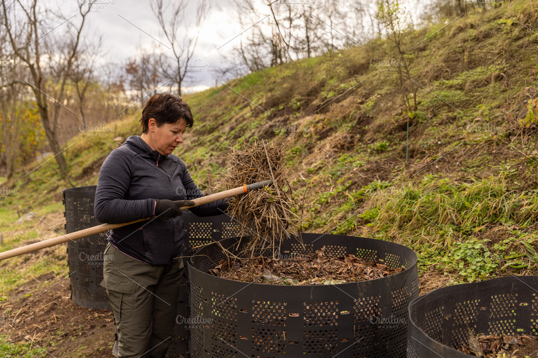 Woman composting organic waste, a Photo by Grafvision photography