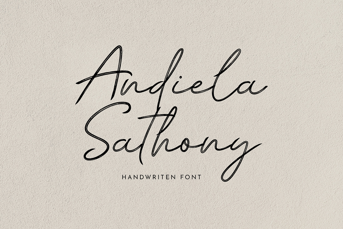 Andiela Sathony Signature Font, a Handwritten Font by UICreative (Photo 1 of 6)