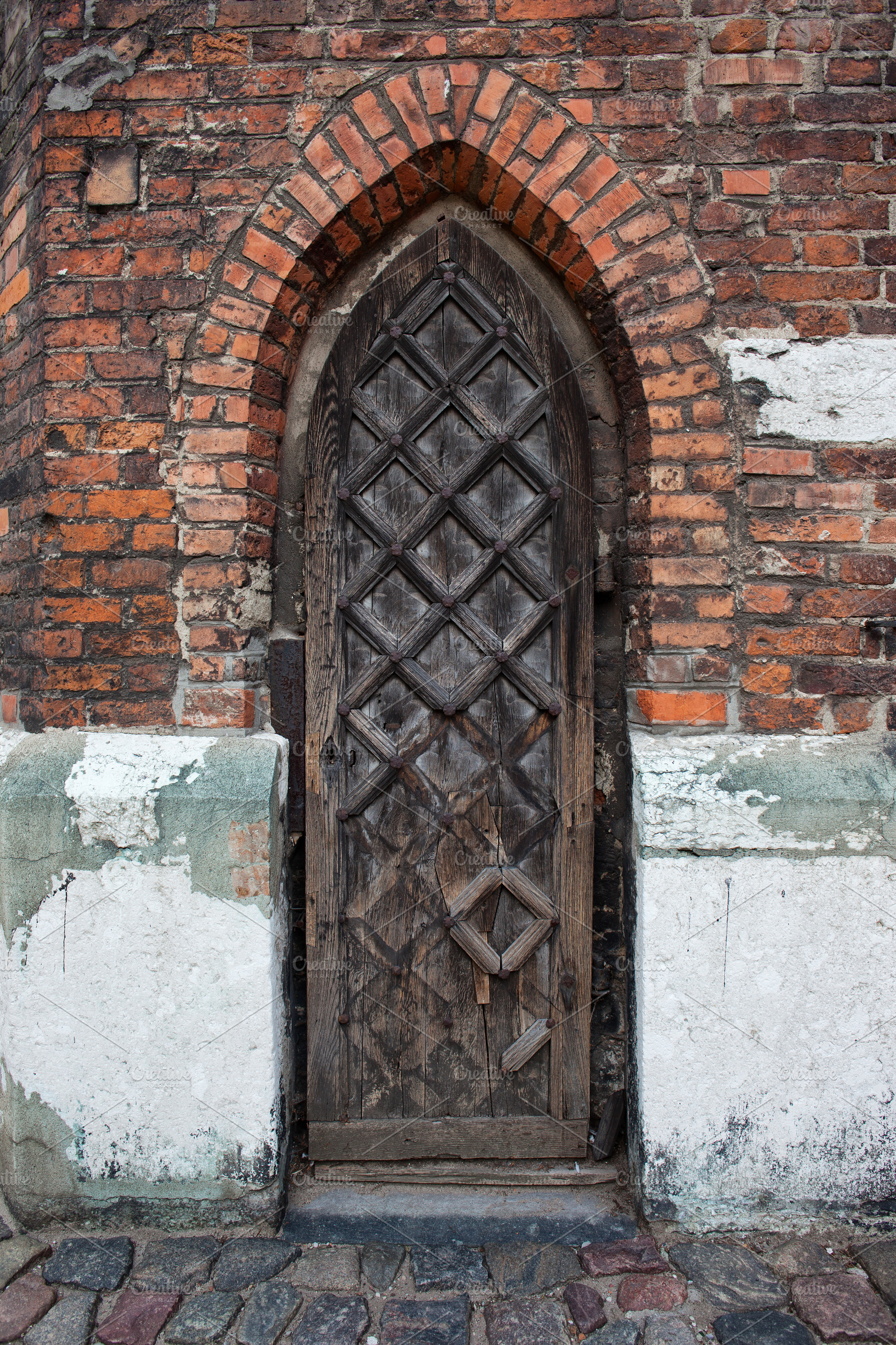 Narrow Gothic Wooden Church Door, an Architecture Photo by Artur Bogacki