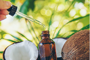 Natural coconut oil in a bottle