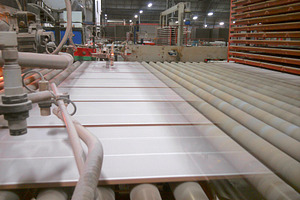 Ceramic tiles entering kiln on conveyor line, an Industrial Photo by Davizro's Market
