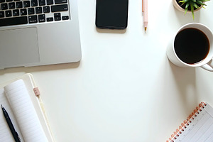 Minimalist Workspace Desk With Lapto, a Photo by LOGOCREATIVE