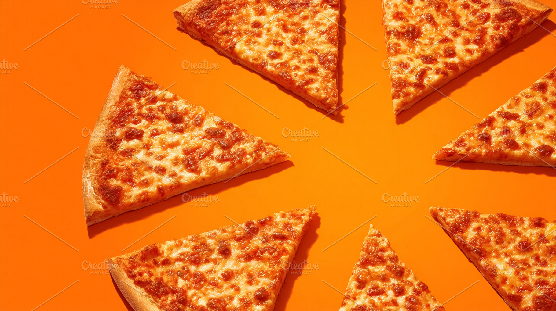 Pizza slices arranging a circular pattern on a vibrant orange ba, a Photo by Studio ANNA