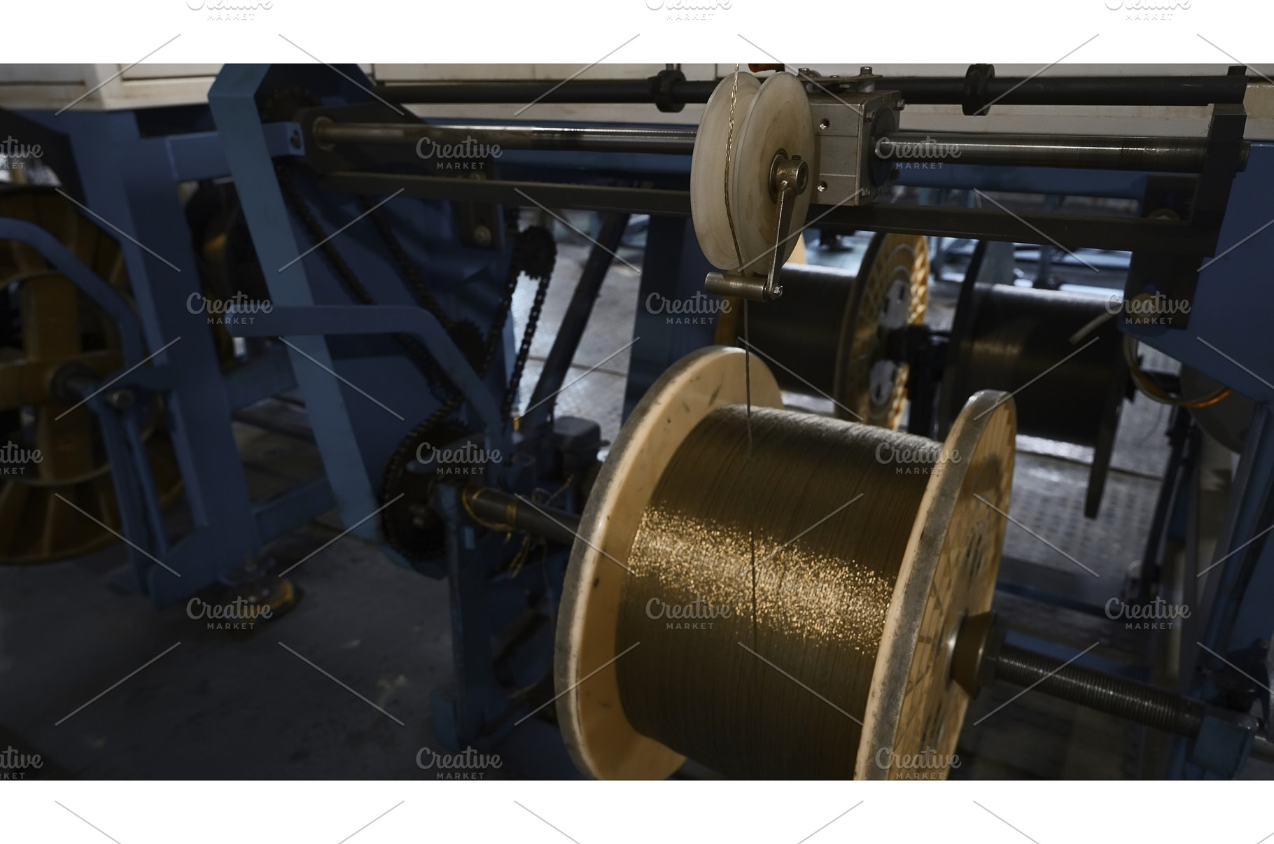 Industrial Machine for winding, an Industrial Photo by Media Whale Stock