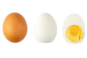 Fresh and hard boiled sliced egg, a Food & Drink Photo by BOOCYS
