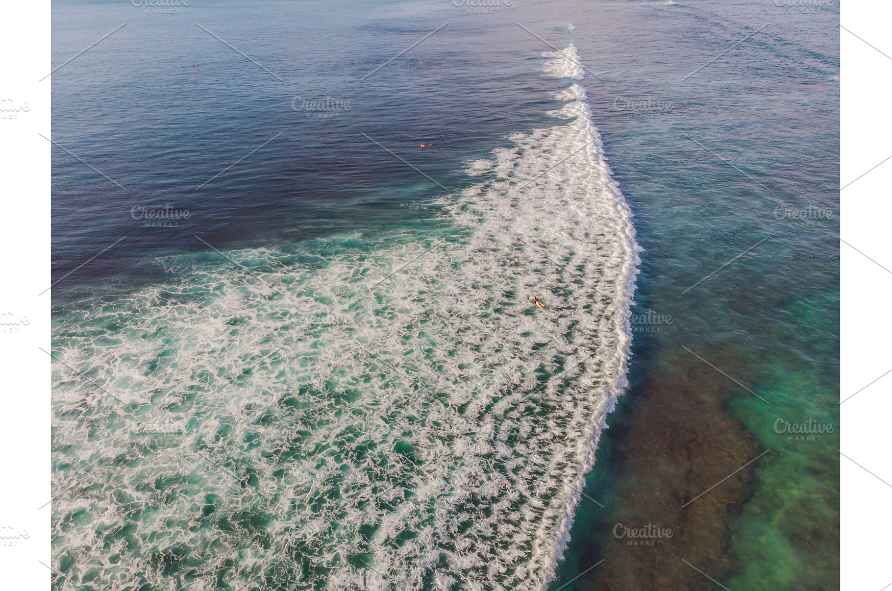 Surfers on the waves in the ocean, a Sports & Recreation Photo by Elizaveta Galitskaya