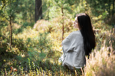 A tranquil moment of reflection in a serene forest setting durin, a Person Photo by Olena Rudo
