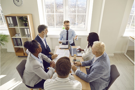Group of diverse business people, a Person Photo by StudioRomantic