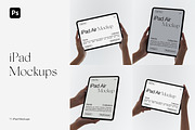 iPad Air in Hand Mockups, an iPad Mockup by Feel This (Thumbnail 1 of 8)