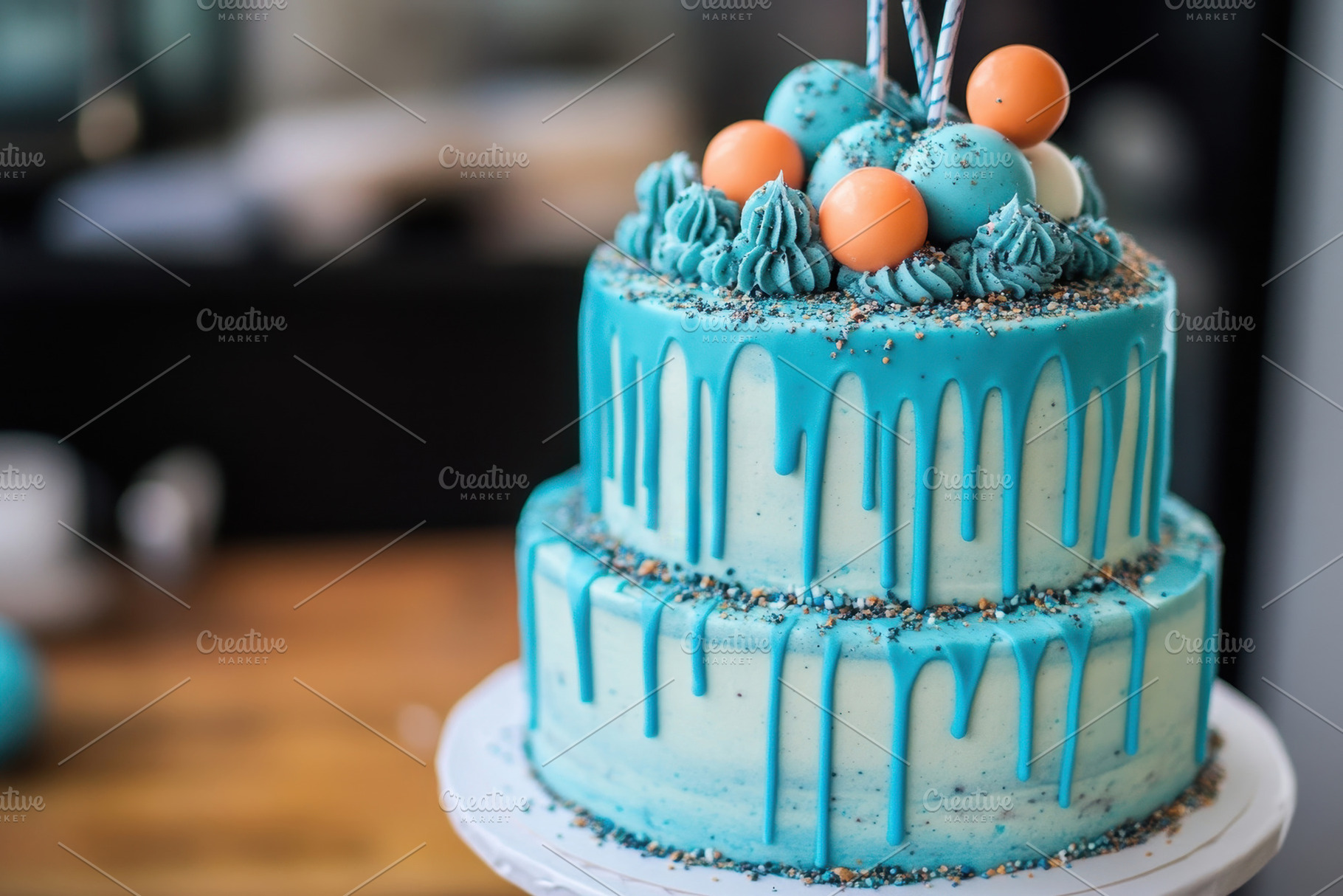 Decorative two-tier cake with blue i, a Photo by Tanuart