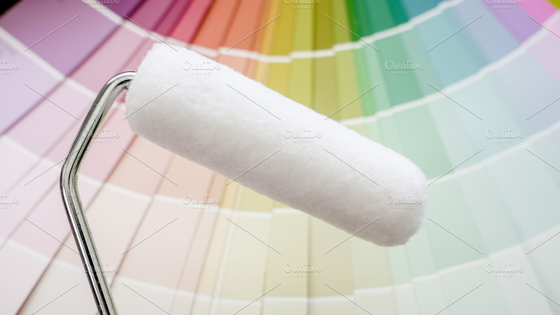 Paint roller foregrounding colorful, an Industrial Photo by 1miromiro