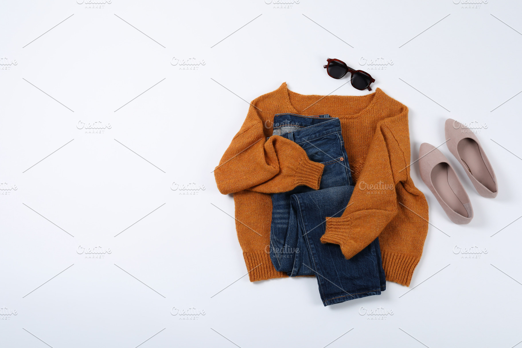 Autumn style clothes on white background, top view, a Beauty & Fashion Photo by AtlasStudio PRO