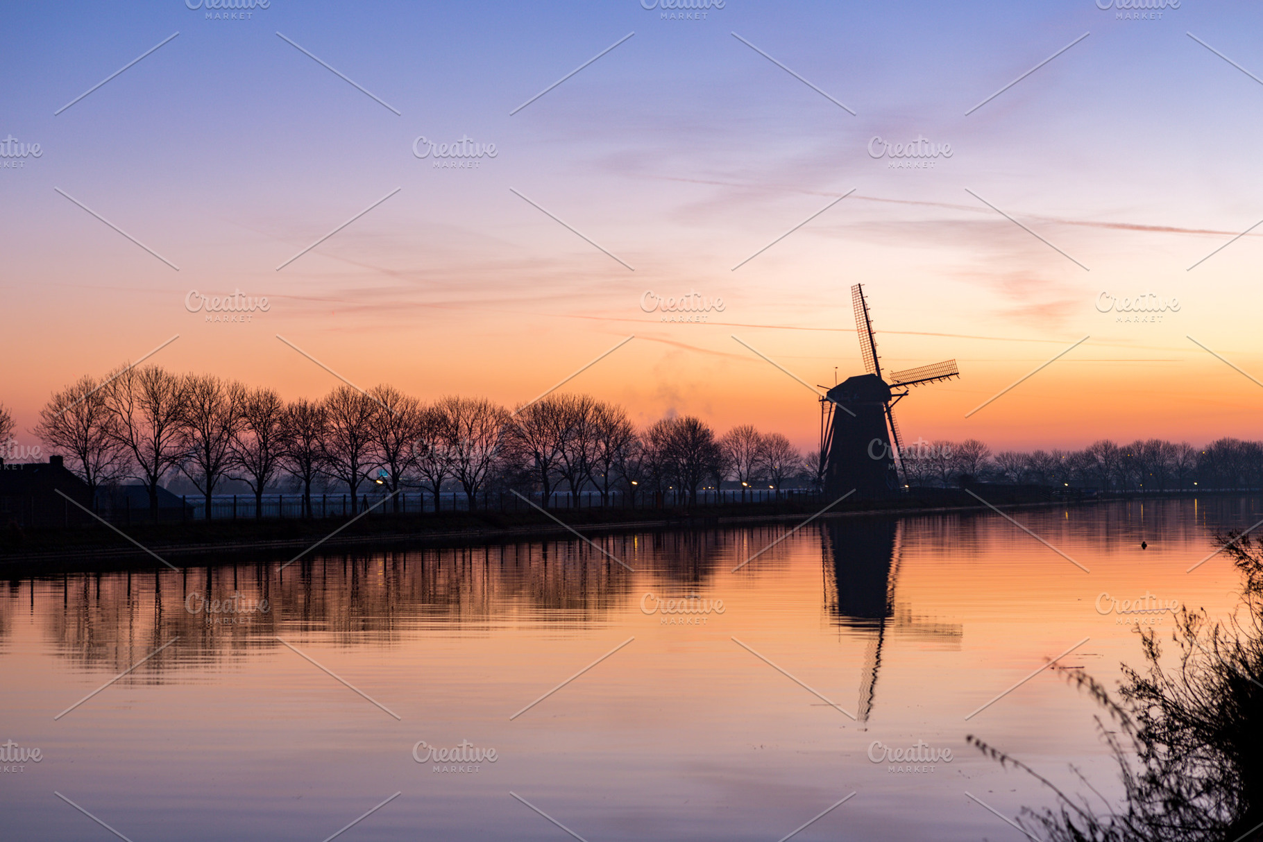 Windmill at sundown in Nieuwe Wetering, a Nature Photo by misign