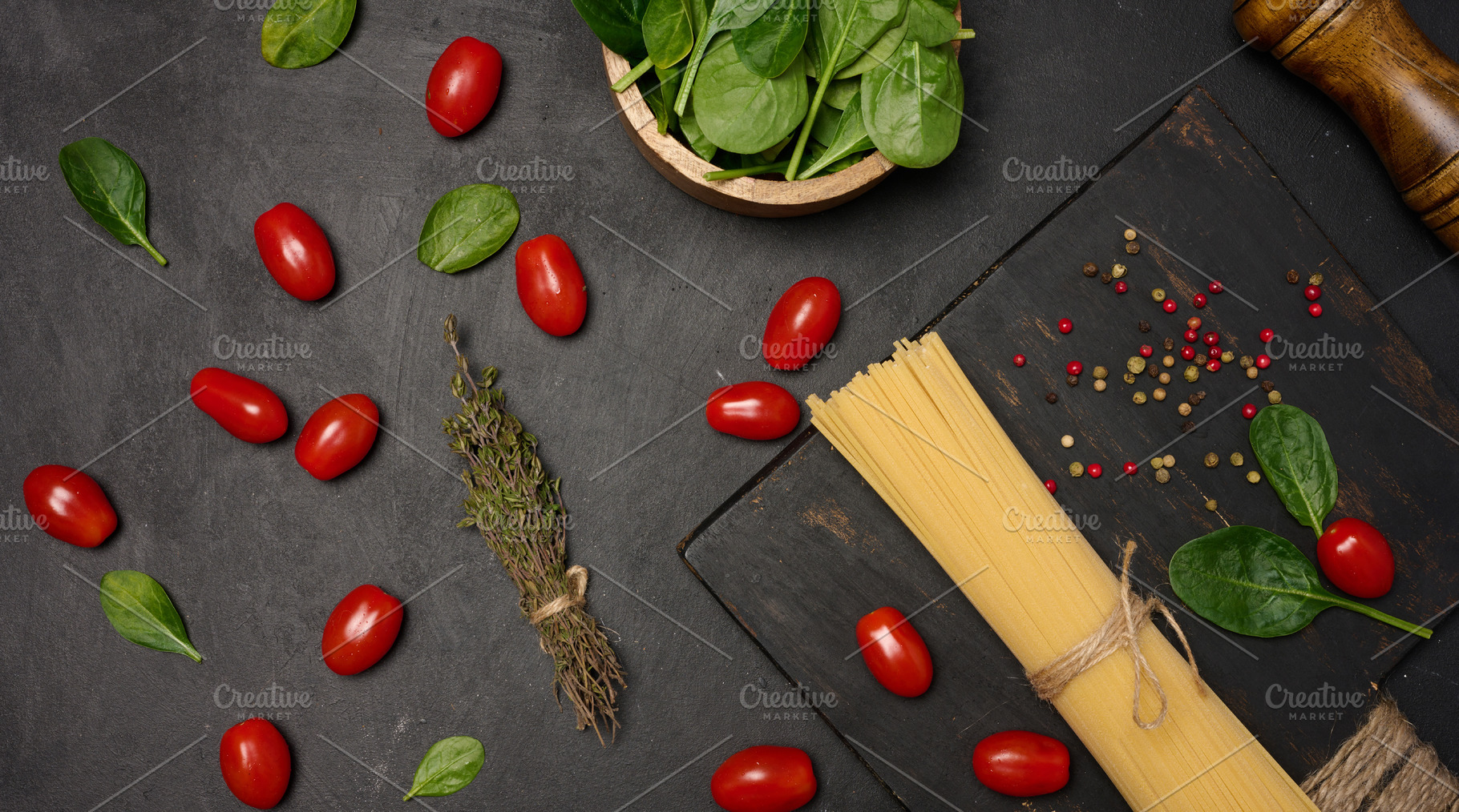 Flat lay of fresh spinach, cherry tomatoes, spaghetti, and spice, a Food & Drink Photo by ndanko