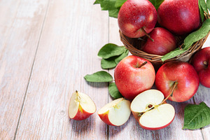 Healthy red apples harvest on rustic wood table, a Food & Drink Photo by Olena Rudo