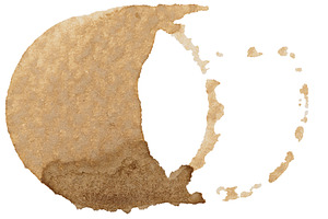 Round stain from a cup of coffee on an isolated background, top, an Abstract Photo by ndanko