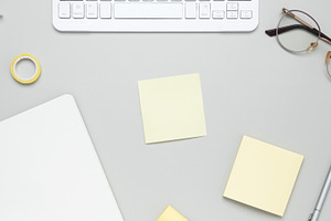 Productive workspace arrangement featuring keyboard, stationery, glasses and no, a Photo by matucha