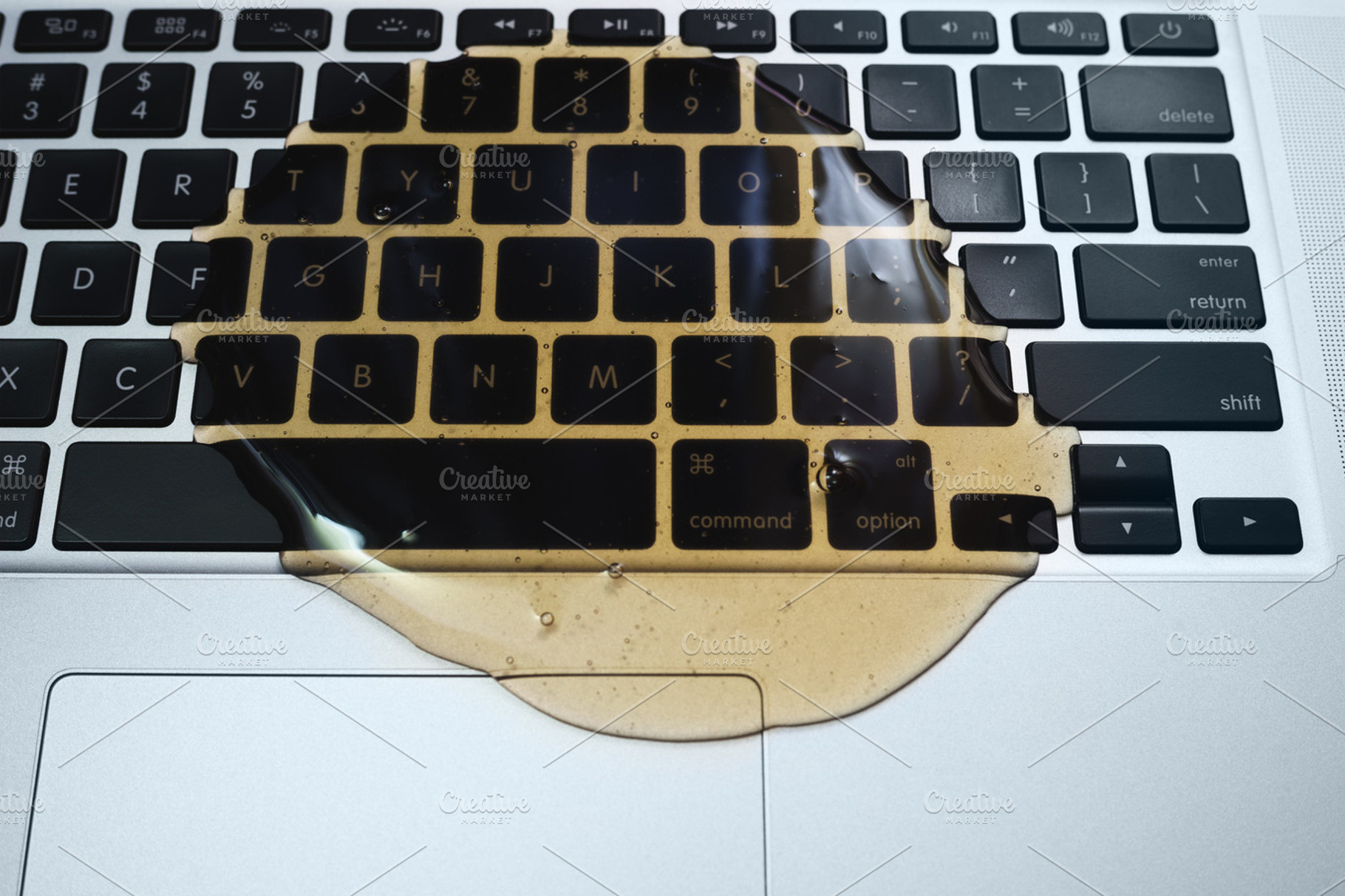 Spilled Liquid on Laptop Keyboard, a Technology Photo by uncle-rico