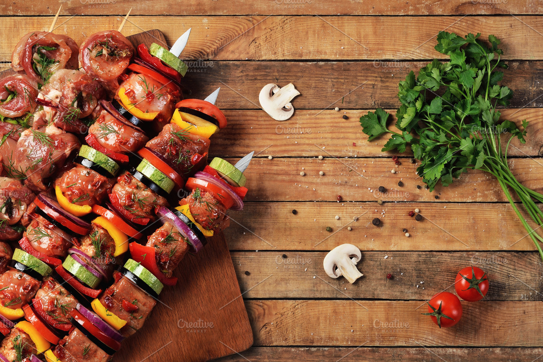 Raw meat and vegetable barbecue, a Food & Drink Photo by Food Stock