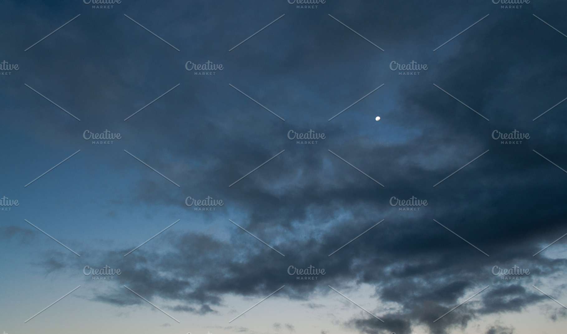 Moon At Sunset