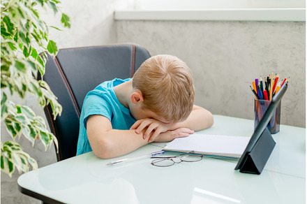 Young boy learn by tablet at home, a School & Education Photo by Ksenia Neyman