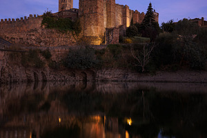 Medieval Castle Illuminated at Sunse, an Architecture Photo by Perpis