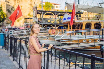 Woman tourist in Old town Kaleici in, an Architecture Photo by Elizaveta Galitskaya