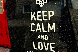 Car decal with message supporting Ukraine and its symbolic emblem. Keep calm an, a Photo by AS photostudio
