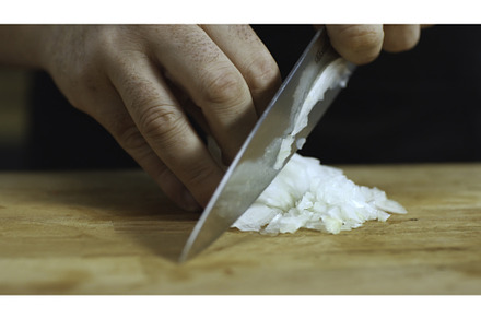 Close-up of man hands cutting white, a Food & Drink Photo by Media Whale Stock