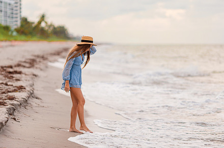 Happy girl enjoy summer vacation on the beach