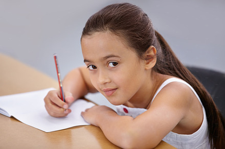Working hard at school, a Photo by Peopleimages.com