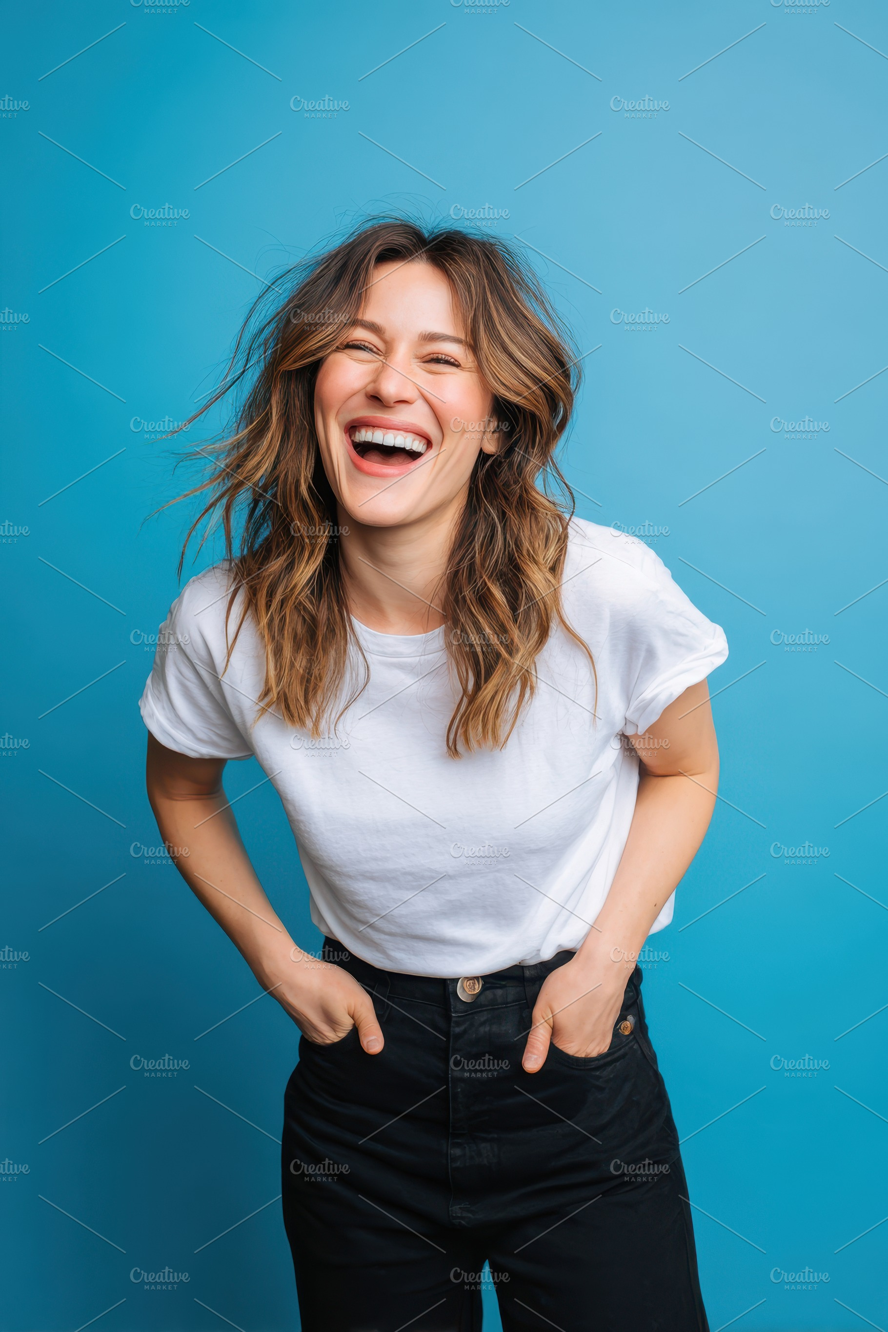 Joyful Woman Laughing on blue background, a Person Photo by AlyaAnd