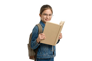 Girl Reading a Book at School, a School & Education Photo by CREATIVEDEF