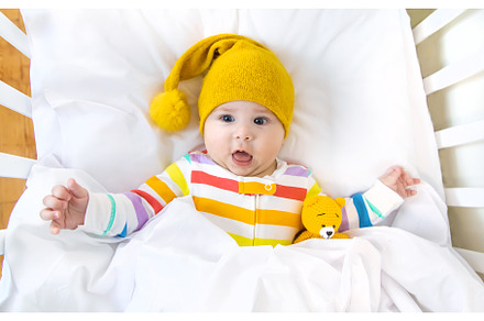 The baby in the crib goes to bed, a Person Photo by yanadjana