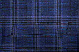 Close-up of blue plaid patterned fabric with pocket seam, ideal, a Food & Drink Photo by Ales Munt