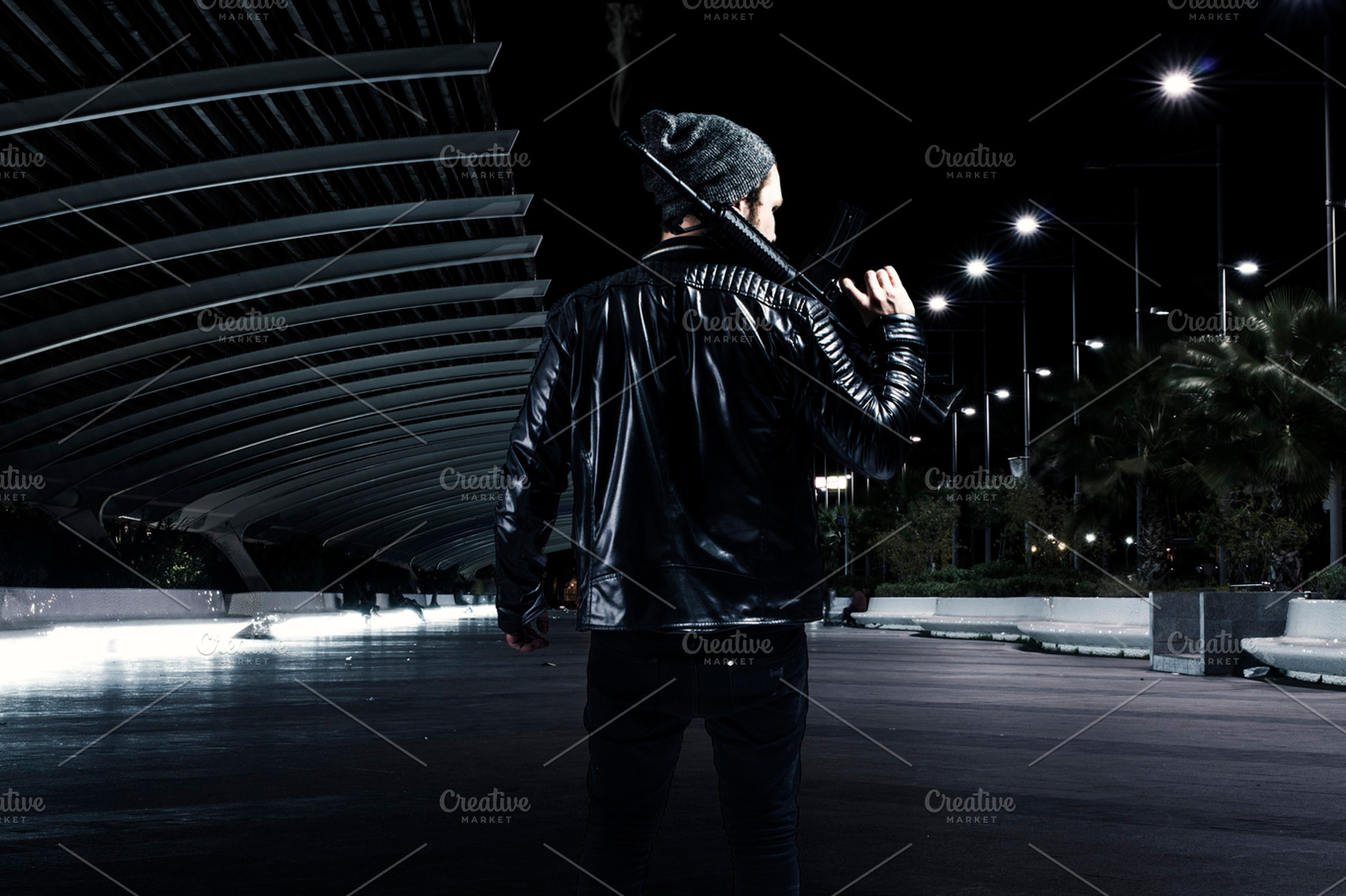 Criminal guy armed with a gun, a Person Photo by Carlos Die Banyuls
