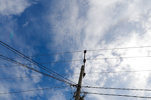 Electric Pole and Wires Against a Br, an Industrial Photo by bastera