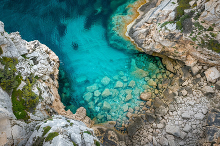 The view showcases clear turquoise w, a Photo by Tanuart