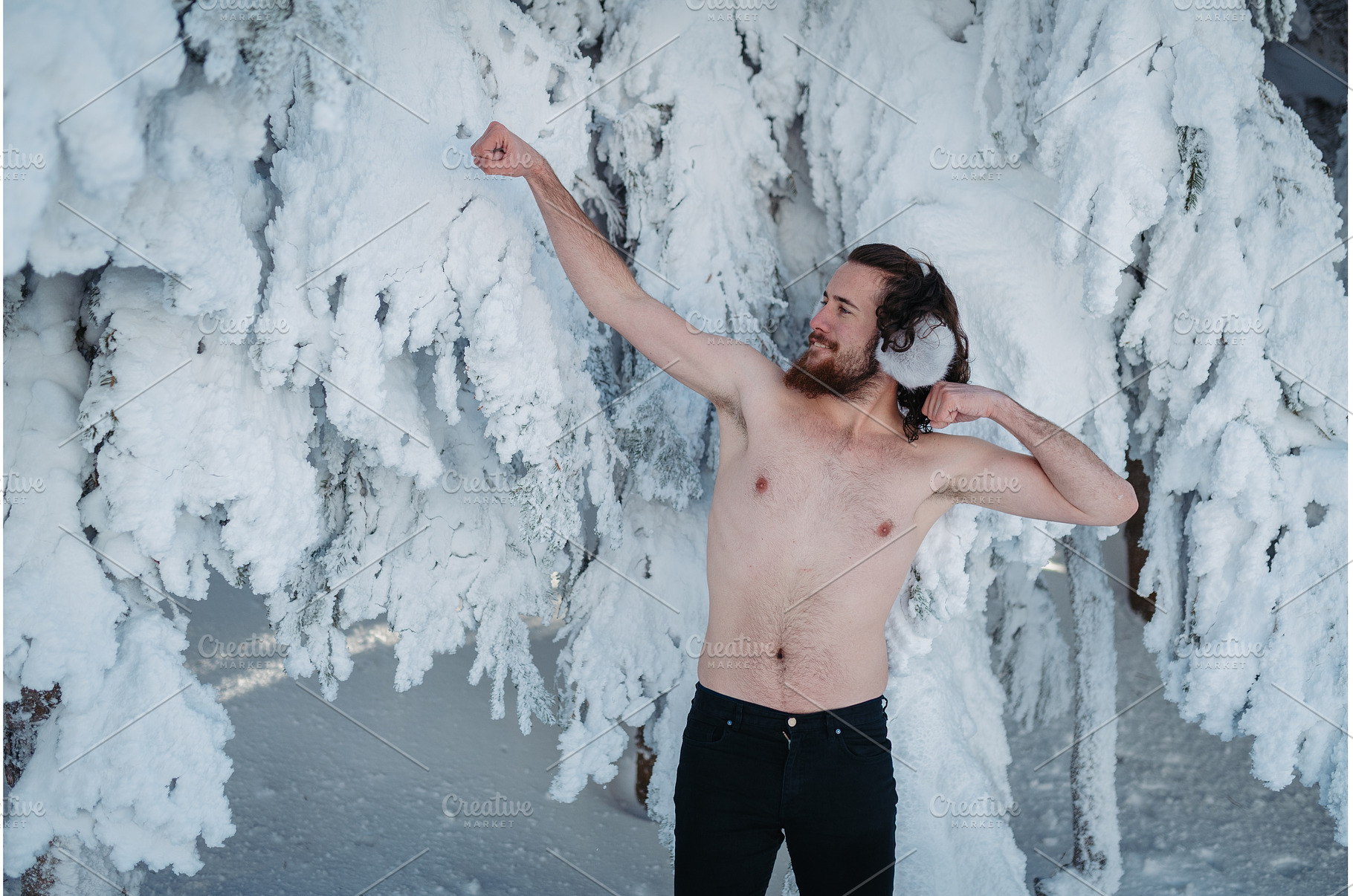 Man with bare torso standing in, a Person Photo by HalfPoint