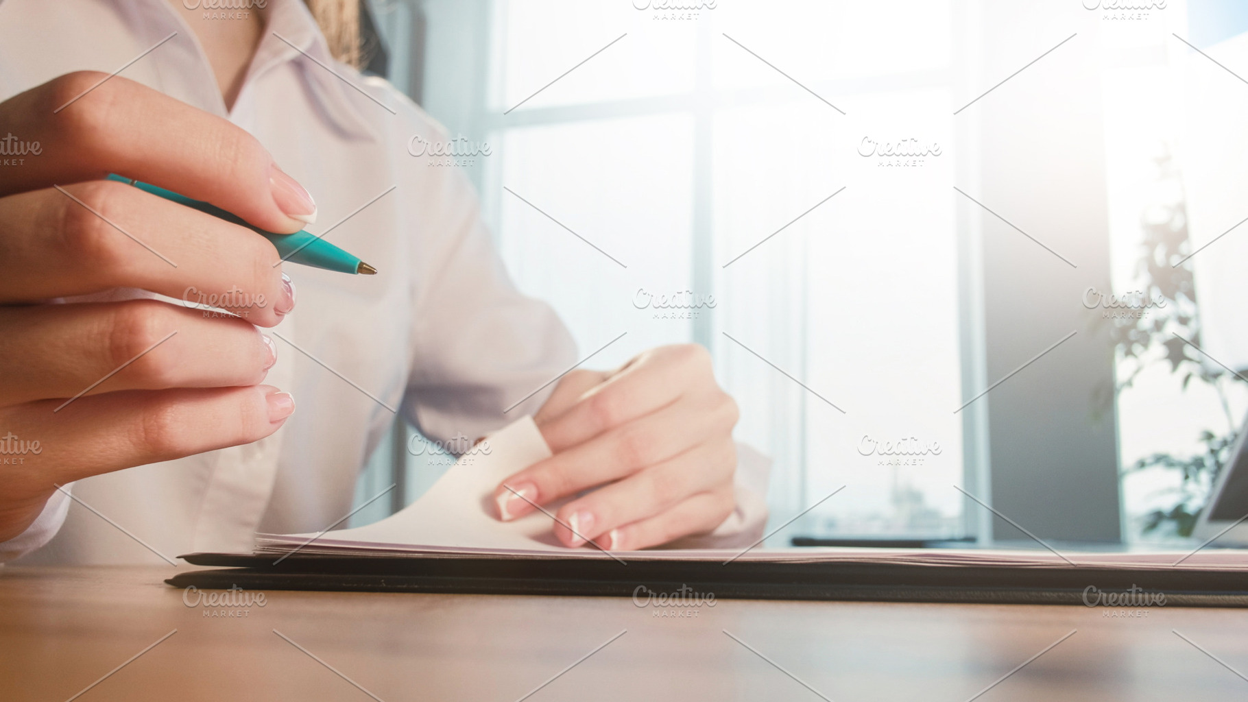 Business paperwork woman pen hand reading document, a Business Photo by Photo Drive Studio