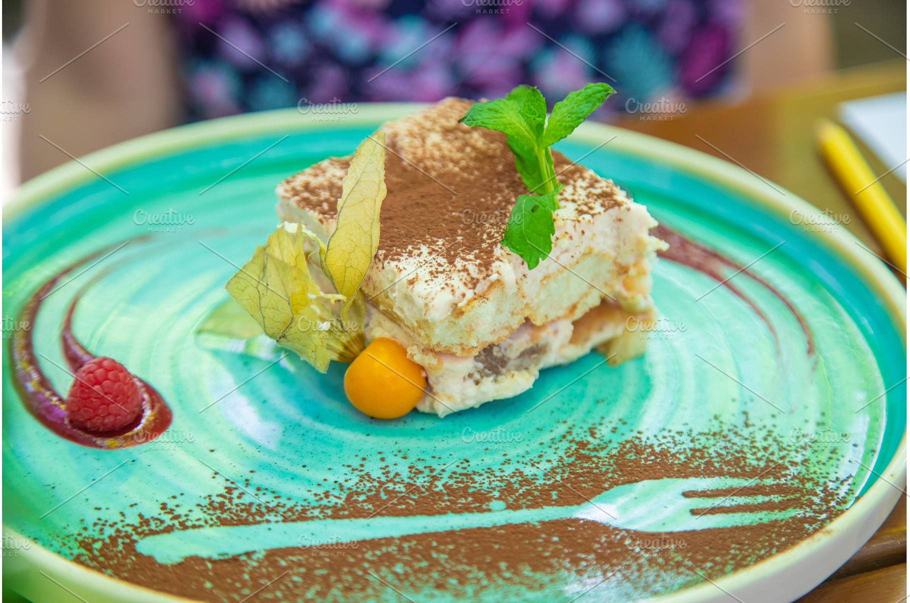Tiramisu on a plate in a cafe, a Food & Drink Photo by yanadjana