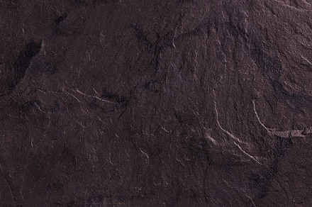 Black slate background featuring black, stone, and background, an Abstract Photo by Grafvision photography