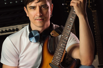 Electric guitar player, a Person Photo by Elena Vagengeim