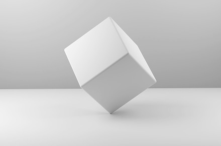Geometric real plastic cube on White