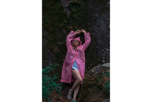 Woman in the taiga forest and rocks, a Person Photo by Jan Jack Russo Media